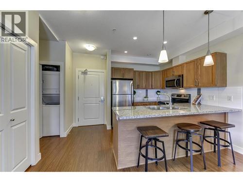 Pictures are from a similar one bedroom staged unit. - 3220 Skyview Lane Unit# 202, West Kelowna, BC - Indoor Photo Showing Kitchen