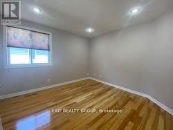 Main Floor Secondary Bedroom - 