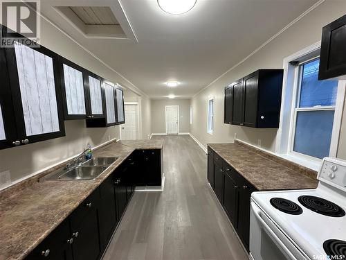 1416 Wascana Street, Regina, SK - Indoor Photo Showing Kitchen With Double Sink