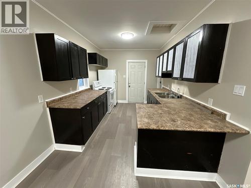 1416 Wascana Street, Regina, SK - Indoor Photo Showing Kitchen With Double Sink