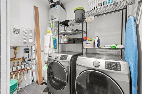 Salle de lavage - 65 Rue Des Trilles, La Conception, QC - Indoor Photo Showing Laundry Room