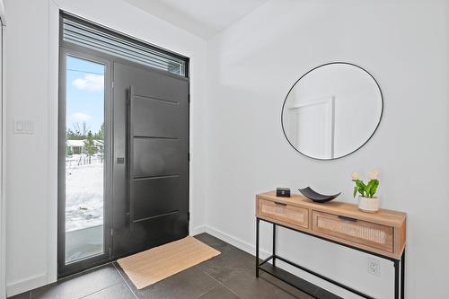 Hall d'entrée/Vestibule - 65 Rue Des Trilles, La Conception, QC - Indoor Photo Showing Other Room