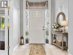 *virtually staged* Entry and office with french doors - 