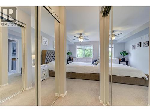 Primary bedroom closests - 265 Froelich Road Unit# 204, Kelowna, BC - Indoor Photo Showing Bedroom