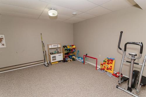 30 Bishop Bay, Carman, MB - Indoor Photo Showing Gym Room