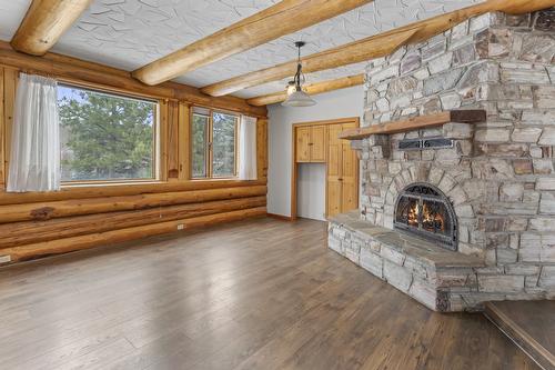 1084 Simmons Road, Creston, BC - Indoor Photo Showing Other Room With Fireplace