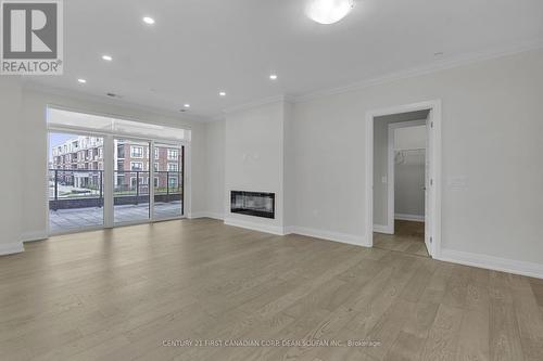 201 - 1975 Fountain Grass Drive, London South (South B), ON - Indoor Photo Showing Living Room With Fireplace
