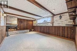 Rec room with electric fireplace - 