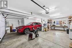 Double car garage 23.3/28.3 length x 25.11 wide - 