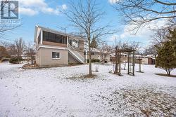 Back of home.  Partially fenced in - 