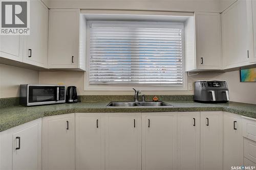 97 Mcgee Crescent, Saskatoon, SK - Indoor Photo Showing Kitchen With Double Sink