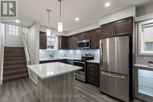 50 - 3200 Singleton Avenue, London South (South W), ON - Indoor Photo Showing Kitchen With Stainless Steel Kitchen With Upgraded Kitchen