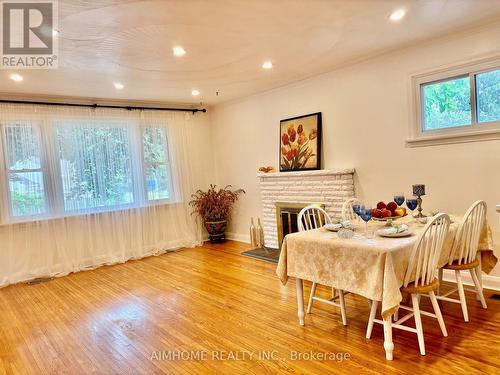 12 Canham Crescent, Toronto, ON - Indoor Photo Showing Dining Room With Fireplace