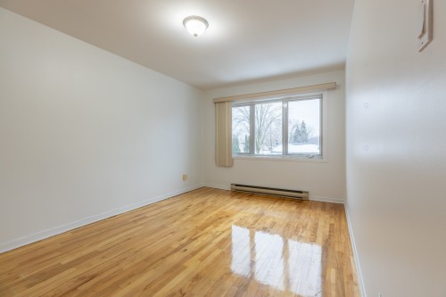 Bedroom - 11907 Boul. Lacordaire, Montréal (Montréal-Nord), QC - Indoor Photo Showing Other Room