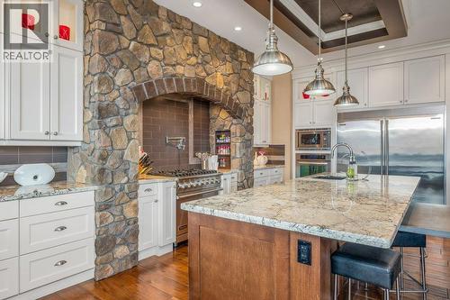 354 Quilchena Drive, Kelowna, BC - Indoor Photo Showing Kitchen With Fireplace With Upgraded Kitchen