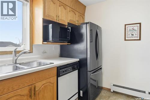 201 103 Keevil Crescent, Saskatoon, SK - Indoor Photo Showing Kitchen With Double Sink