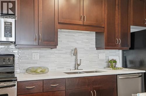 702 902 Spadina Crescent E, Saskatoon, SK - Indoor Photo Showing Kitchen With Double Sink With Upgraded Kitchen
