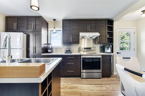 Cuisine - 875 Rg De L'Achigan, L'Assomption, QC - Indoor Photo Showing Kitchen With Double Sink With Upgraded Kitchen