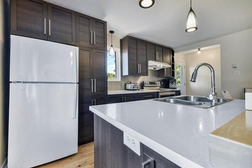 Cuisine - 875 Rg De L'Achigan, L'Assomption, QC - Indoor Photo Showing Kitchen With Double Sink With Upgraded Kitchen