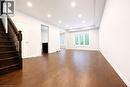 Unfurnished living room featuring stairway, dark wood finished floors, and recessed lighting - 127 Elmbank Trail Unit# Upper, Kitchener, ON  - Indoor Photo Showing Other Room 