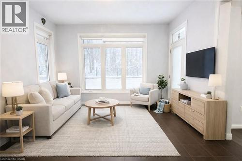 Living area featuring baseboards - 127 Elmbank Trail Unit# Upper, Kitchener, ON - Indoor Photo Showing Living Room