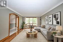 Living room with hardwood floors - 