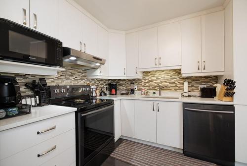 Cuisine - 3-980 Ch. Du Fleuve, Les Cèdres, QC - Indoor Photo Showing Kitchen