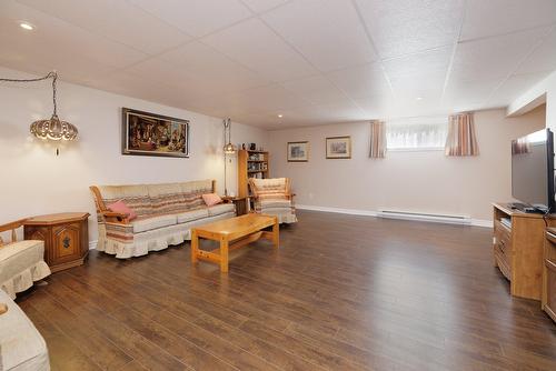 Salle de jeux - 3-980 Ch. Du Fleuve, Les Cèdres, QC - Indoor Photo Showing Living Room