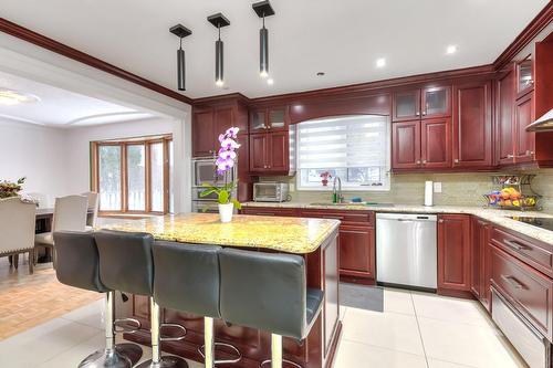 Cuisine - 34 Rue Valmount, Dollard-Des-Ormeaux, QC - Indoor Photo Showing Kitchen With Upgraded Kitchen