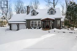 Attached 2-car garage has 240V outlet - 