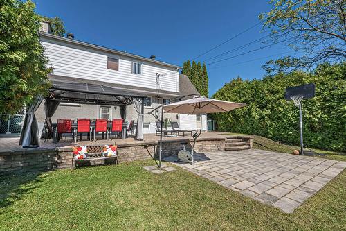 Jardin - 488 Boul. Samson, Laval (Sainte-Dorothée), QC - Outdoor With Deck Patio Veranda