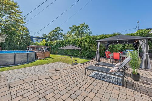 Vue d'ensemble - 488 Boul. Samson, Laval (Sainte-Dorothée), QC - Outdoor With Above Ground Pool