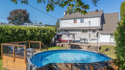 Vue d'ensemble - 488 Boul. Samson, Laval (Sainte-Dorothée), QC - Outdoor With Above Ground Pool