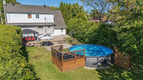 Vue d'ensemble - 488 Boul. Samson, Laval (Sainte-Dorothée), QC - Outdoor With Above Ground Pool