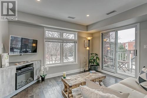 2386 Munns Avenue E, Oakville, ON - Indoor Photo Showing Living Room With Fireplace