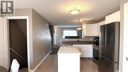 2 1621 First Street, Estevan, SK - Indoor Photo Showing Kitchen With Double Sink