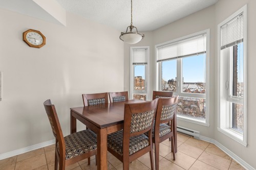 Salle à manger - 609-3855 Boul. De Chenonceau, Laval (Chomedey), QC - Indoor Photo Showing Dining Room