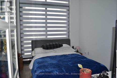 Primary Bedroom - 103 - 1606 Charles Street, Whitby, ON - Indoor Photo Showing Bedroom