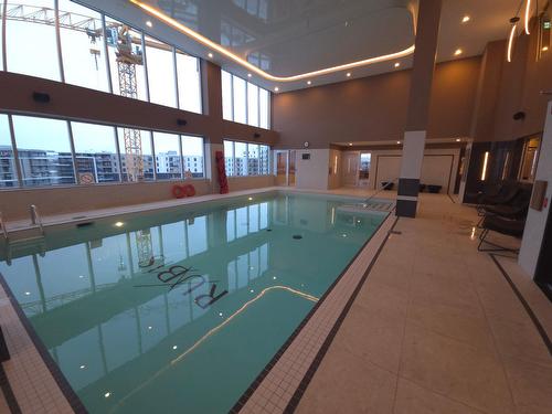 Pool - 1007-4775 Rue Gertrude-Roy, Québec (Les Rivières), QC - Indoor Photo Showing Other Room With In Ground Pool