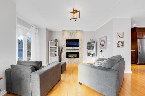 Salon - 815 Rue Timothée-Kimber, Saint-Eustache, QC - Indoor Photo Showing Living Room With Fireplace