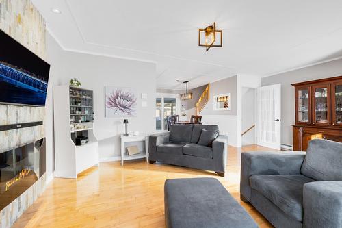 Salon - 815 Rue Timothée-Kimber, Saint-Eustache, QC - Indoor Photo Showing Living Room With Fireplace