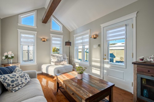 Solarium/Verrière - 178 Rue St-Germain, Saint-Hugues, QC - Indoor Photo Showing Living Room With Fireplace