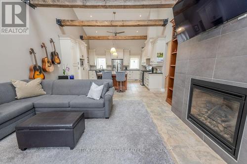 8 Spring Street, Westport, ON - Indoor Photo Showing Living Room With Fireplace