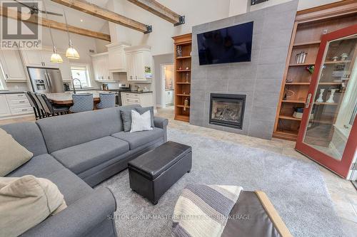 8 Spring Street, Westport, ON - Indoor Photo Showing Living Room With Fireplace