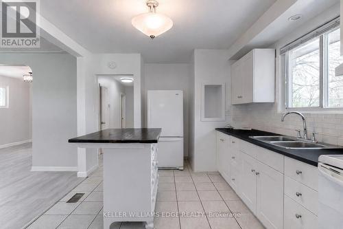 164 West 19Th Street, Hamilton, ON - Indoor Photo Showing Kitchen With Double Sink