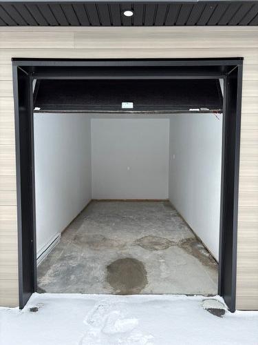 Garage - 301-120 Place Marc-Favreau, Cowansville, QC - Indoor Photo Showing Garage