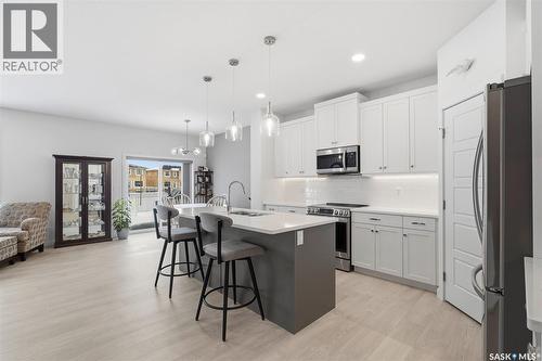 112 Forsey Avenue, Saskatoon, SK - Indoor Photo Showing Kitchen With Stainless Steel Kitchen With Upgraded Kitchen