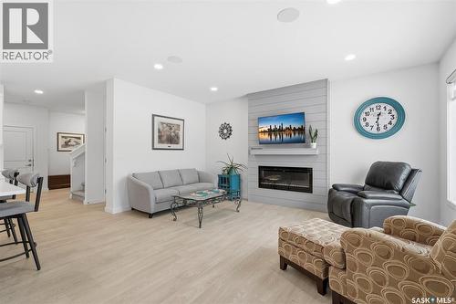 112 Forsey Avenue, Saskatoon, SK - Indoor Photo Showing Living Room With Fireplace