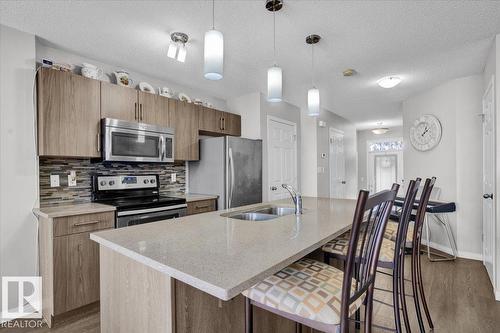745 Eagleson Cr Nw, Edmonton, AB - Indoor Photo Showing Kitchen With Stainless Steel Kitchen With Double Sink With Upgraded Kitchen