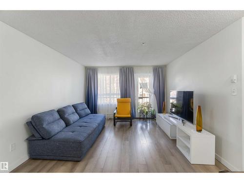 #324 5350 199 St Nw, Edmonton, AB - Indoor Photo Showing Living Room